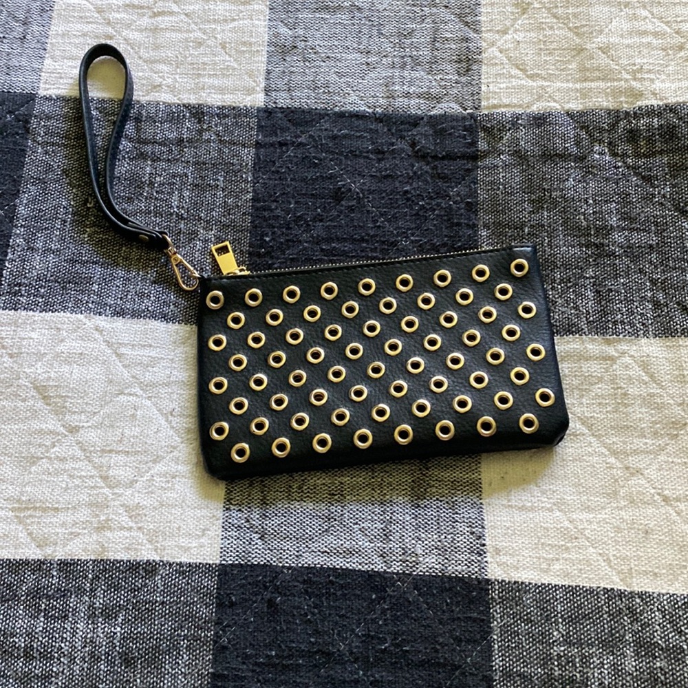 Black wristlet with gold studs